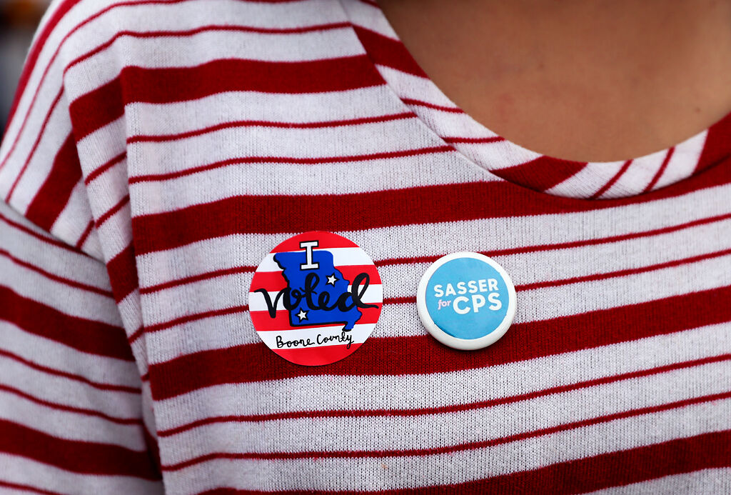 Trisha Chaudhary wears a sticker